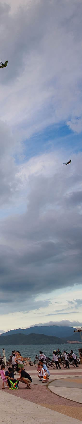 Kite flying on the walkway alongside Nha Trang Beach in Vietnam 