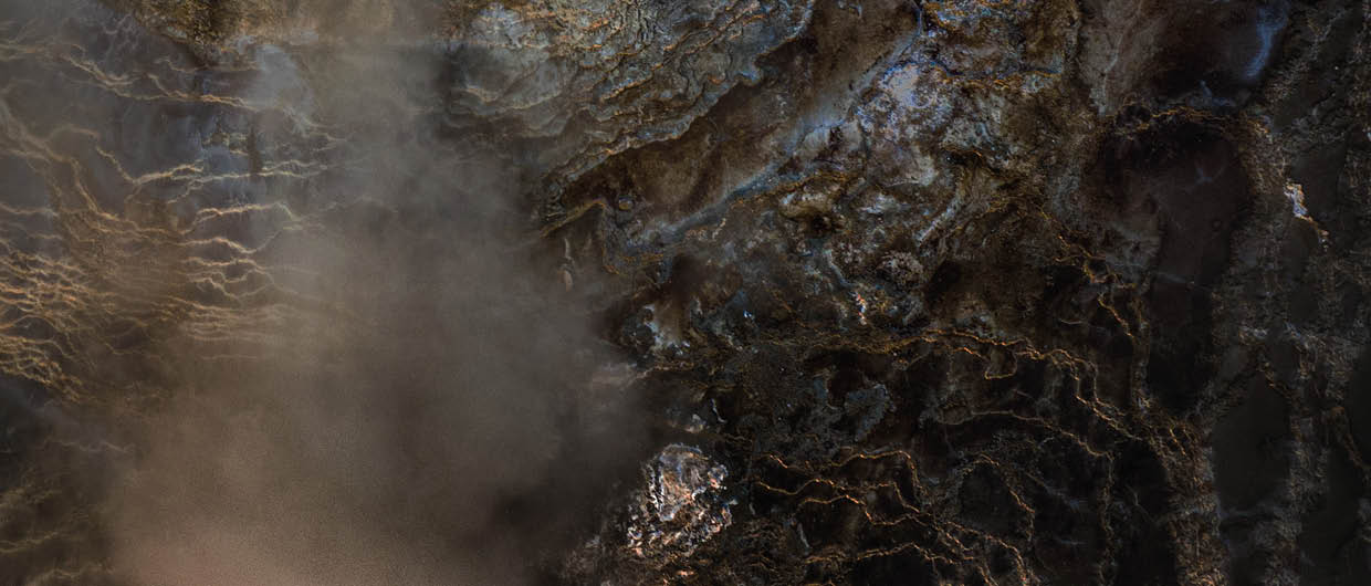Iceland  The top-down view of an emerald geothermal pool in the Icelandic Highlands 