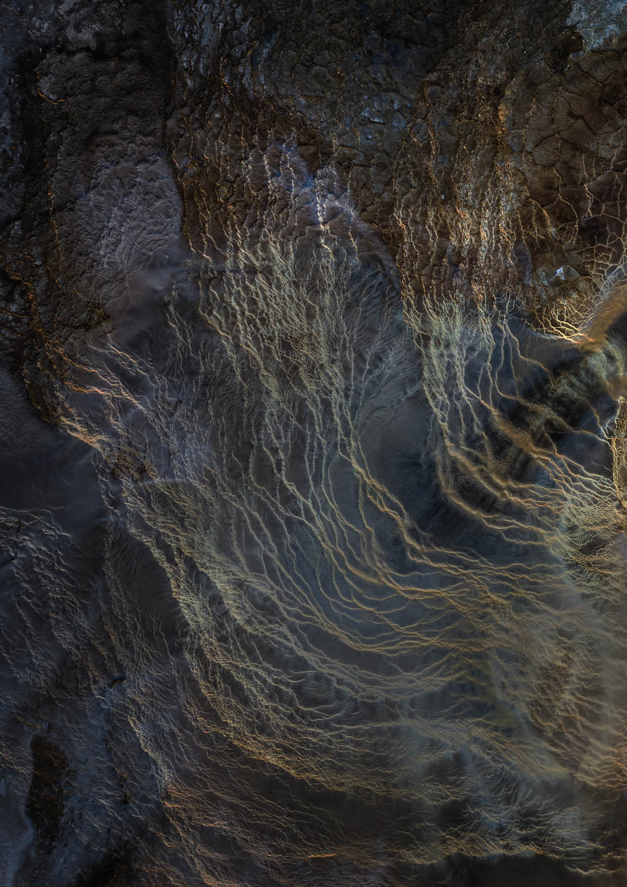 Iceland. The top-down view of an emerald geothermal pool in the Icelandic Highlands.