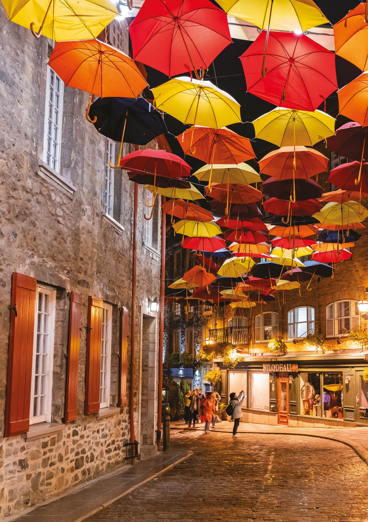 Night view of the Breakneck Stairs area with colorful umbrella hanging at Quebec, Canada