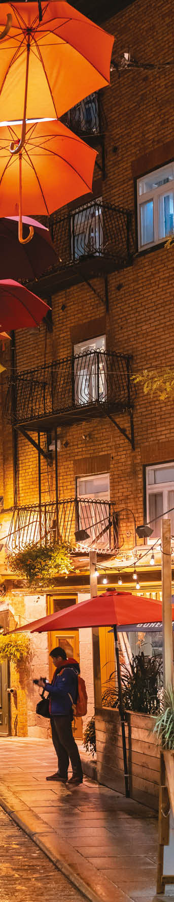 Night view of the Breakneck Stairs area with colorful umbrella hanging at Quebec, Canada