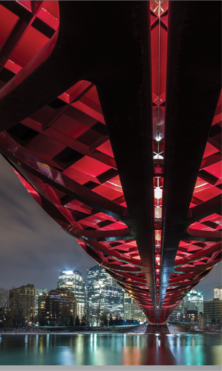 Pedestrian Peace Bridge and Downtown Calgary reflecting in the Bow River at night. Calgary, Alberta, Canada.  from Offset. ID: 486758 Claude Robidoux / All Canada https://www.offset.com/photos/pedestrian-peace-bridge-and-downtown-calgary-reflecting-in-the-bow-486758