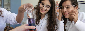 Young students do science experiments at their school in Belo Horizonte, Brazil.