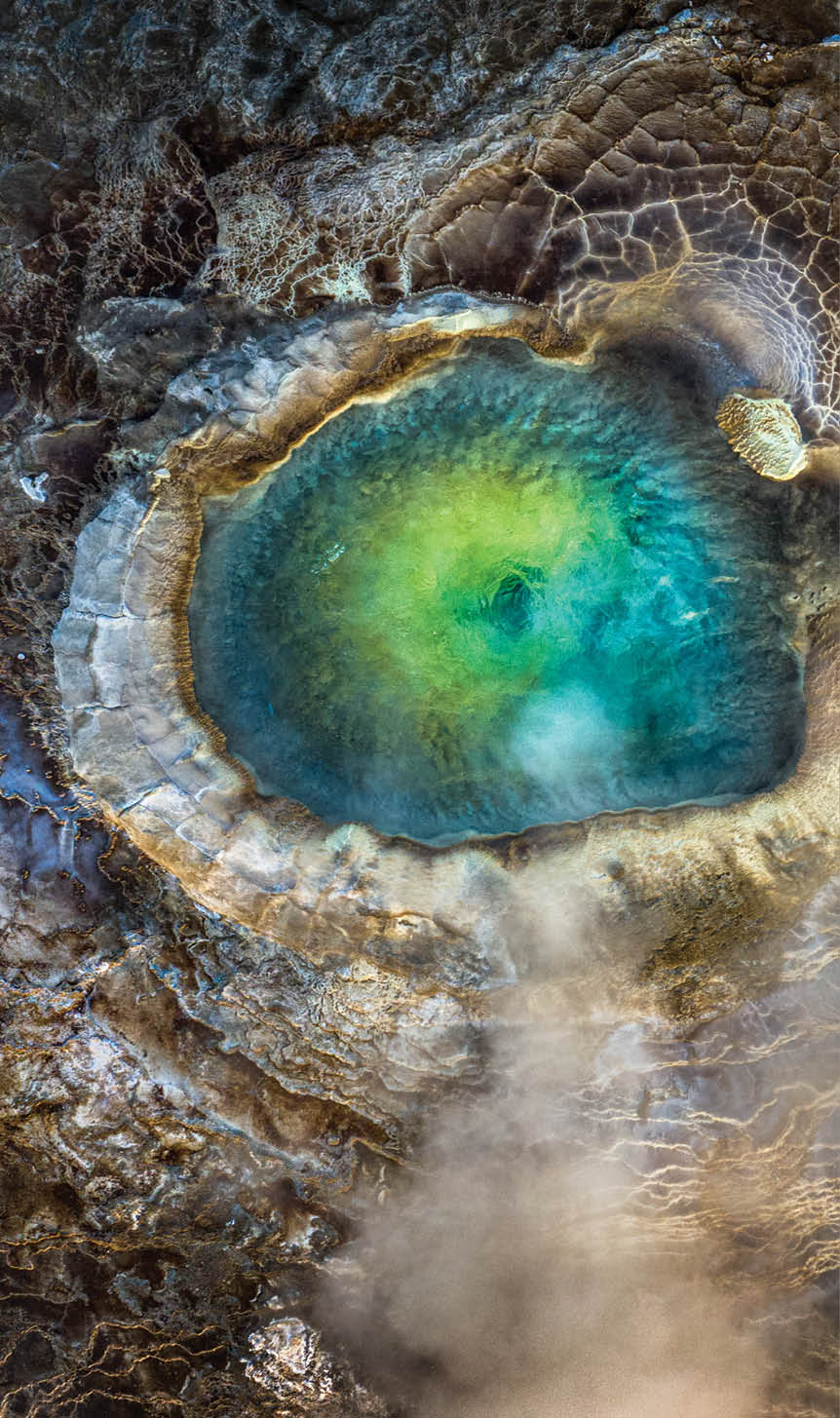 Iceland. The top-down view of an emerald geothermal pool in the Icelandic Highlands.