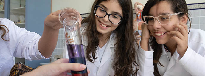 Young students do science experiments at their school in Belo Horizonte, Brazil.