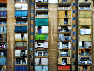 Although at first sight you only see 60 colorful balconies in this residential building in Beirut (Lebanon), I think it's more interesting to see them as 60 different stories behind each - knowing the many different races, religions and political parties that usually live side by side in this exciting city