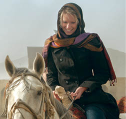 This image made in Afghanistan in 2008 shows Shannon Galpin founder of the non-profit Mountain to Mountain riding upon a Buzkashi pony while in the field on her first discovery trip in country.