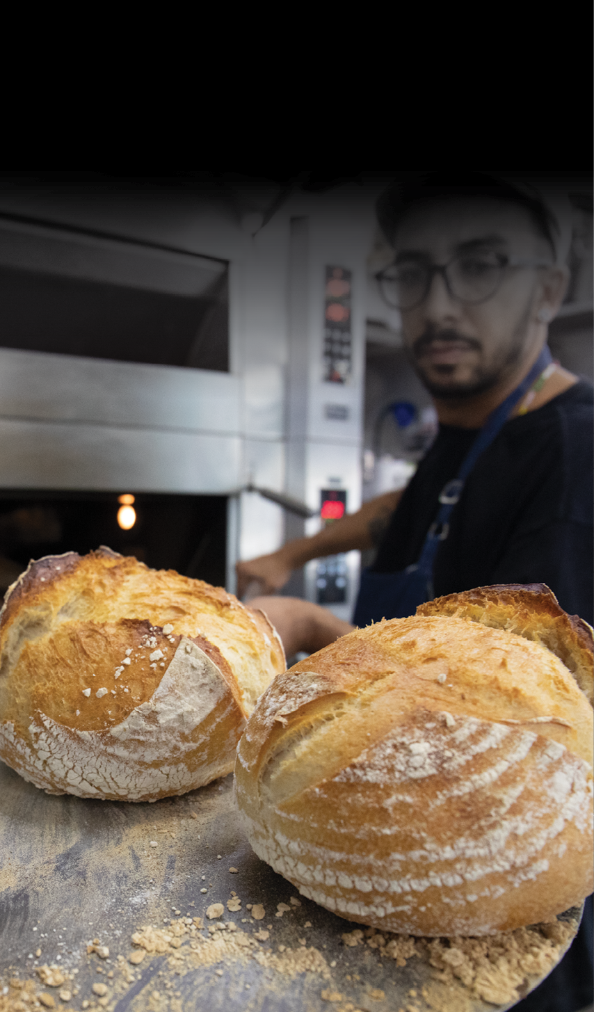 Pastry chef, Tiago Oliveira Saraiva, prepares bread in his kitchen in Sao Paulo, Brazil.