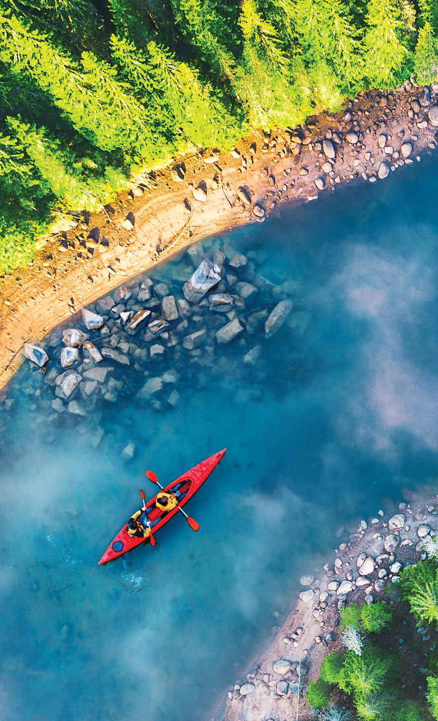 People canoe through a national park in Bulgaria. Over 36 percent of Bulgaria is forested, and the country has 3 national parks, 11 nature parks, and 55 nature reserves that range from the tallest mountains on the Balkan Peninsula to the sands of the Black Sea.