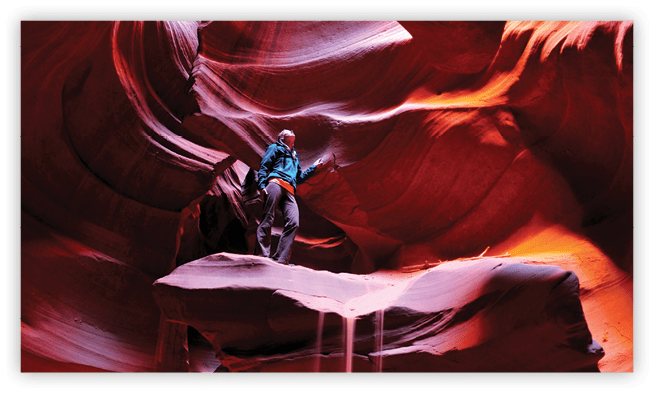 A woman explores Antelope Canyon in Utah.