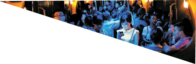 On a hot day in Hong Kong, people crowded into an air-conditioned train. When the lights dimmed, one young woman stood out, lost in the glow of her own digital world.