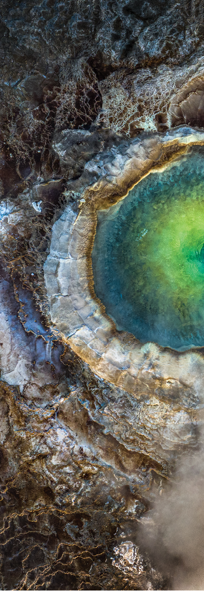 Iceland. The top-down view of an emerald geothermal pool in the Icelandic Highlands.