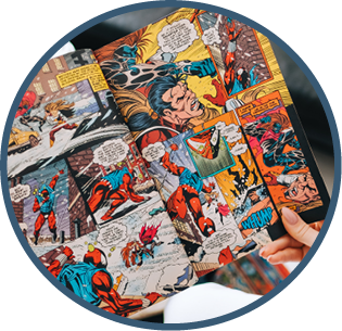 Person reading comic book at home in living room.