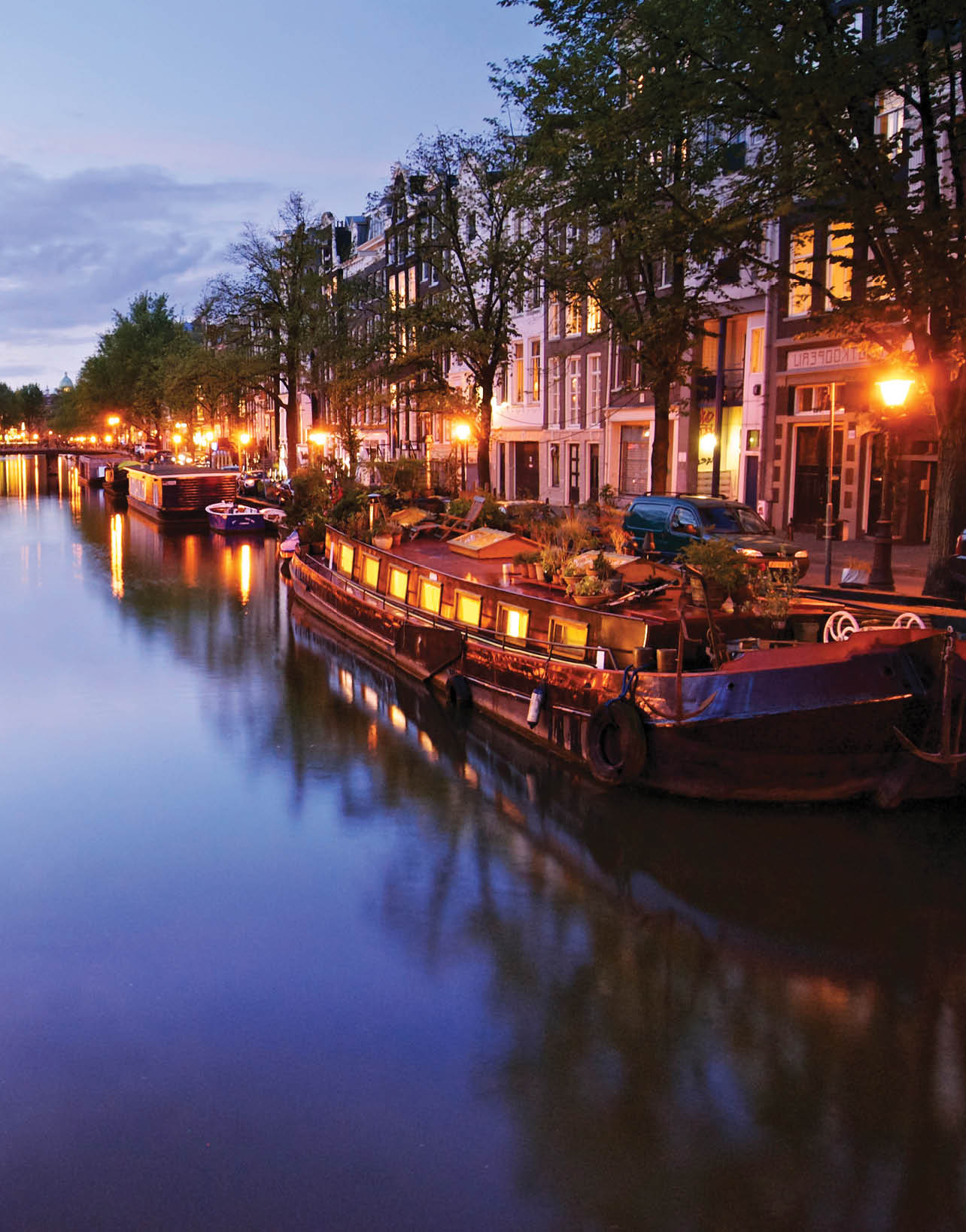 Canal houseboats in Amsterdam. Travel in Amsterdam, Netherlands for National Geographic Expeditions' European Odyssey 2009