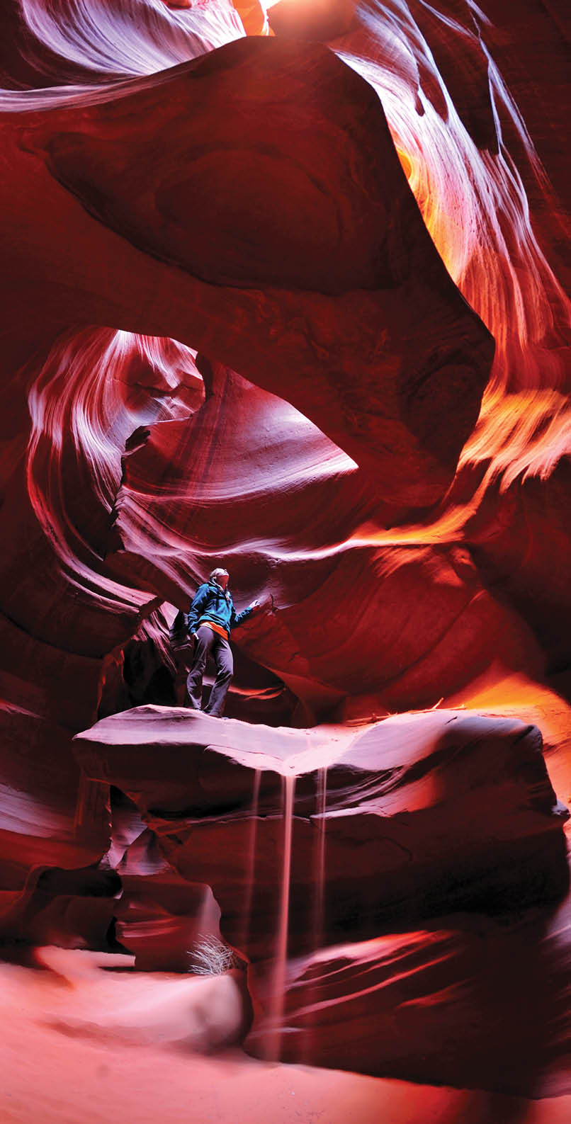A woman explores Antelope Canyon in Utah 