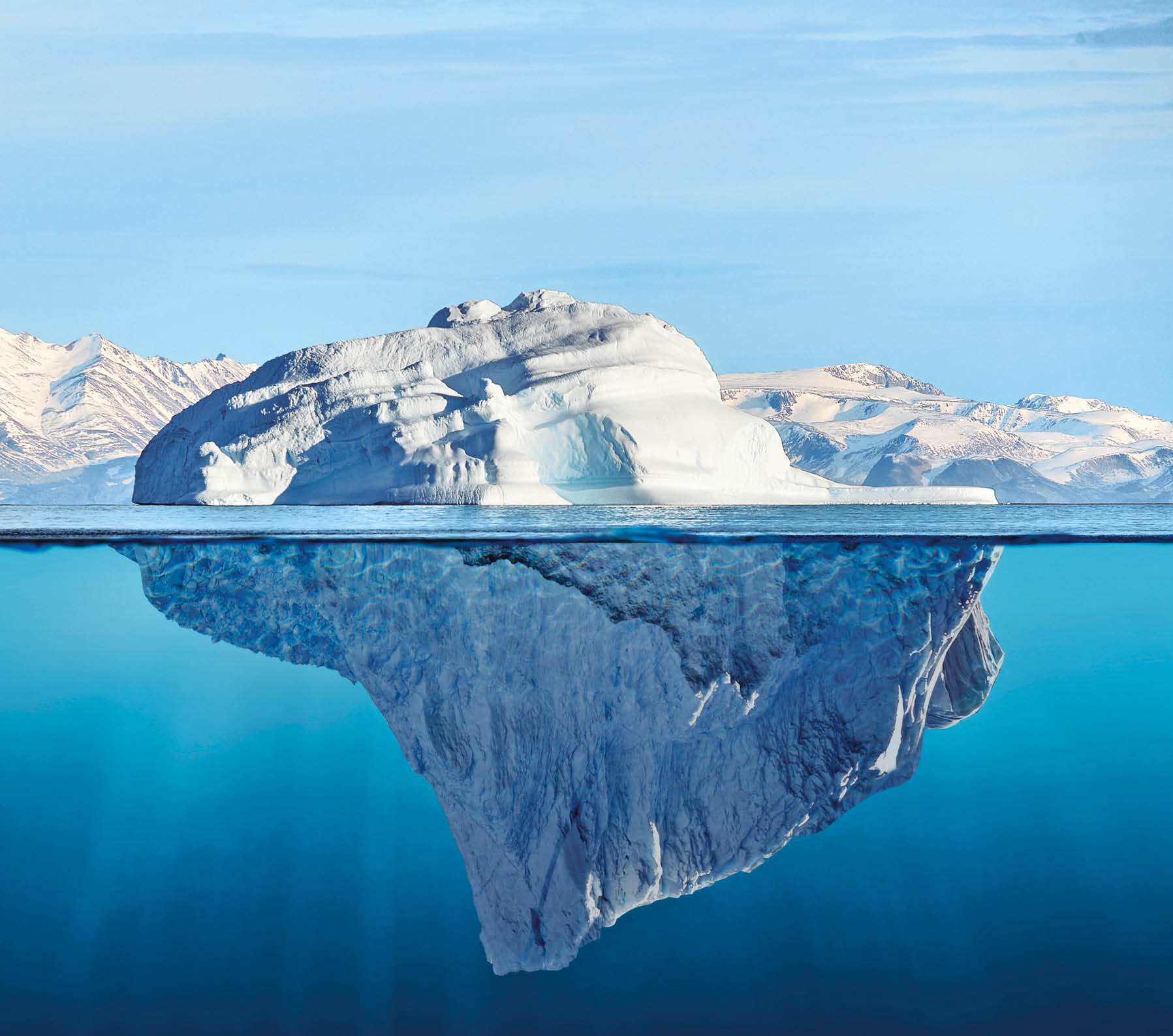iceberg with above and underwater view taken in greenland