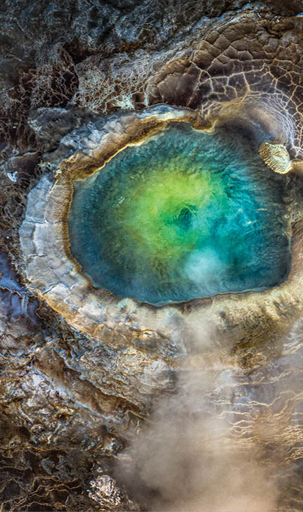 Iceland. The top-down view of an emerald geothermal pool in the Icelandic Highlands.