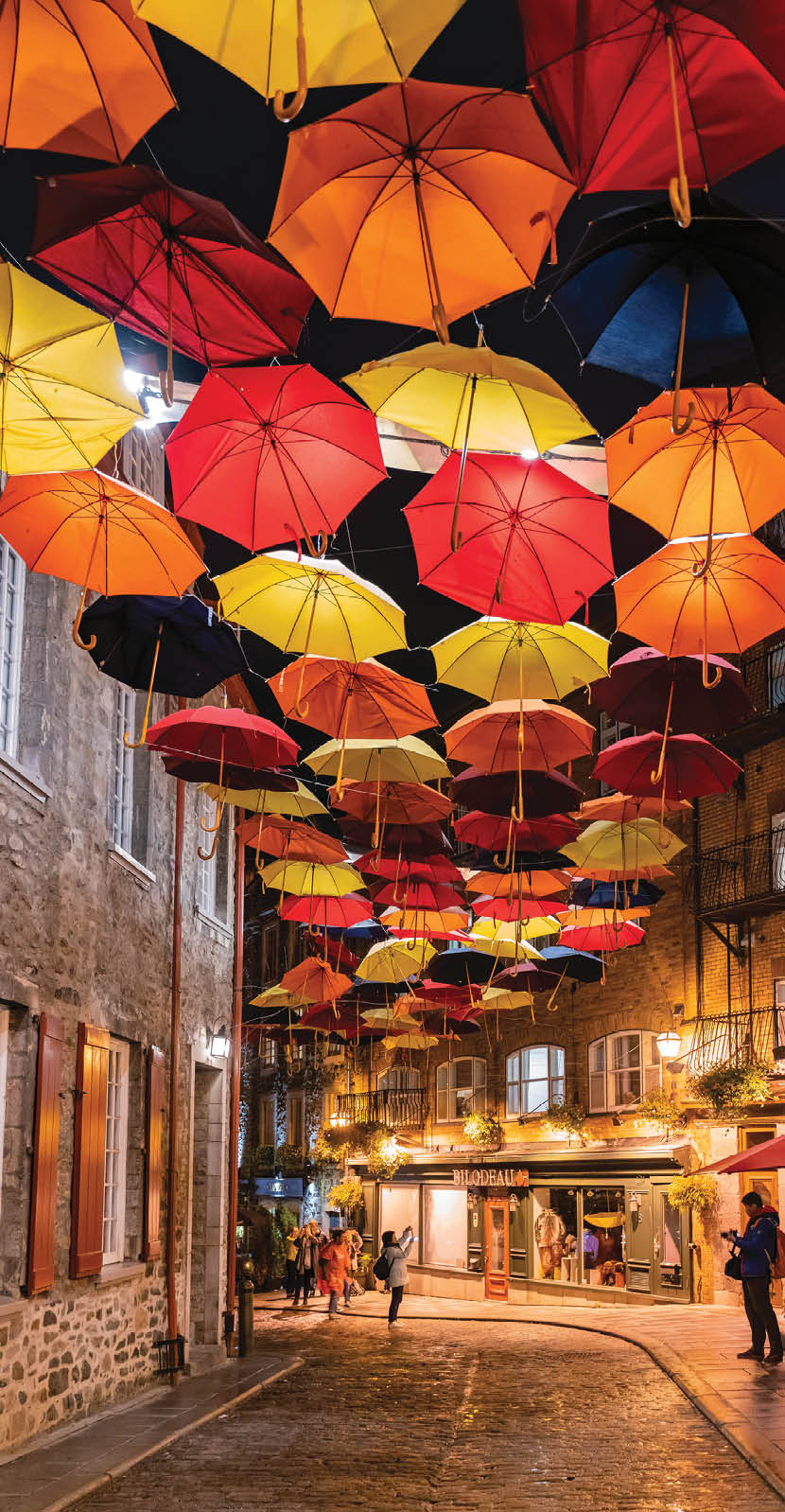 Night view of the Breakneck Steps area with colorful umbrella hanging 