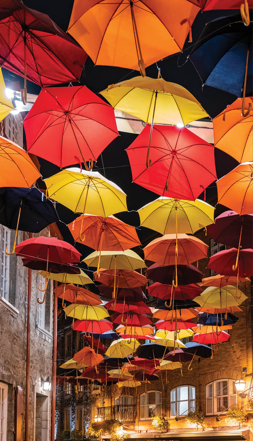 Night view of the Breakneck Stairs area with colorful umbrella hanging at Quebec, Canada