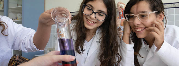 Young students do science experiments at their school in Belo Horizonte, Brazil.