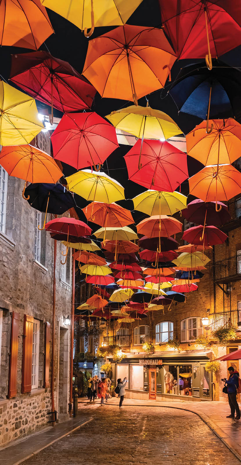 Night view of the Breakneck Steps area with colorful umbrella hanging.