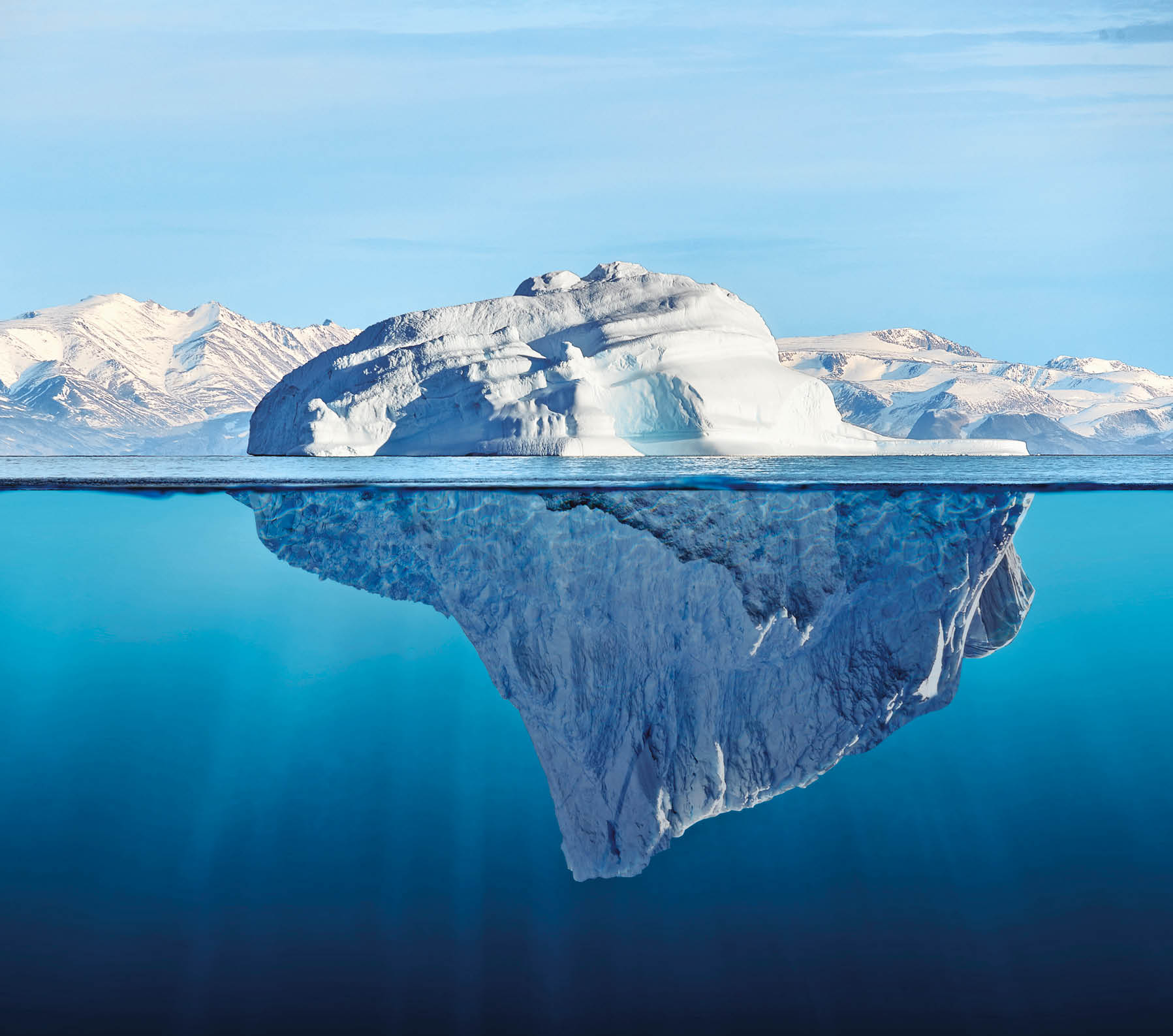 iceberg with above and underwater view taken in greenland