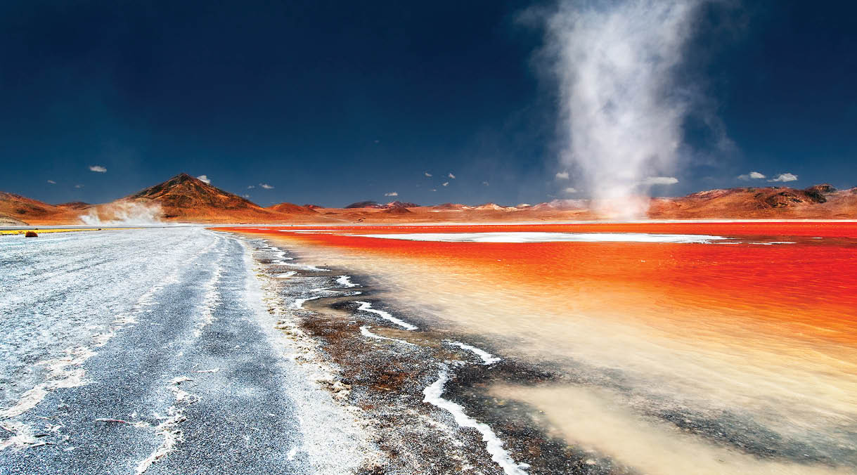 A dust devil swirls across Laguna Colorada, the 'red lake'.